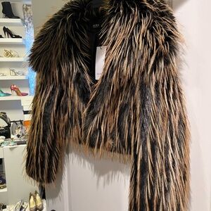 AKIRA Black and Tan Faux Fur Teddy Jacket By Azela Wang. Full price at Nordstrom